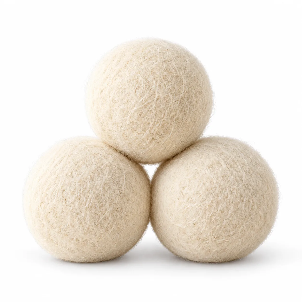 Three natural wool dryer balls