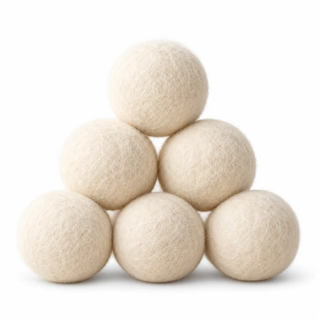 Six natural wool dryer balls